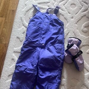 Purple snowsuit for a toddler.